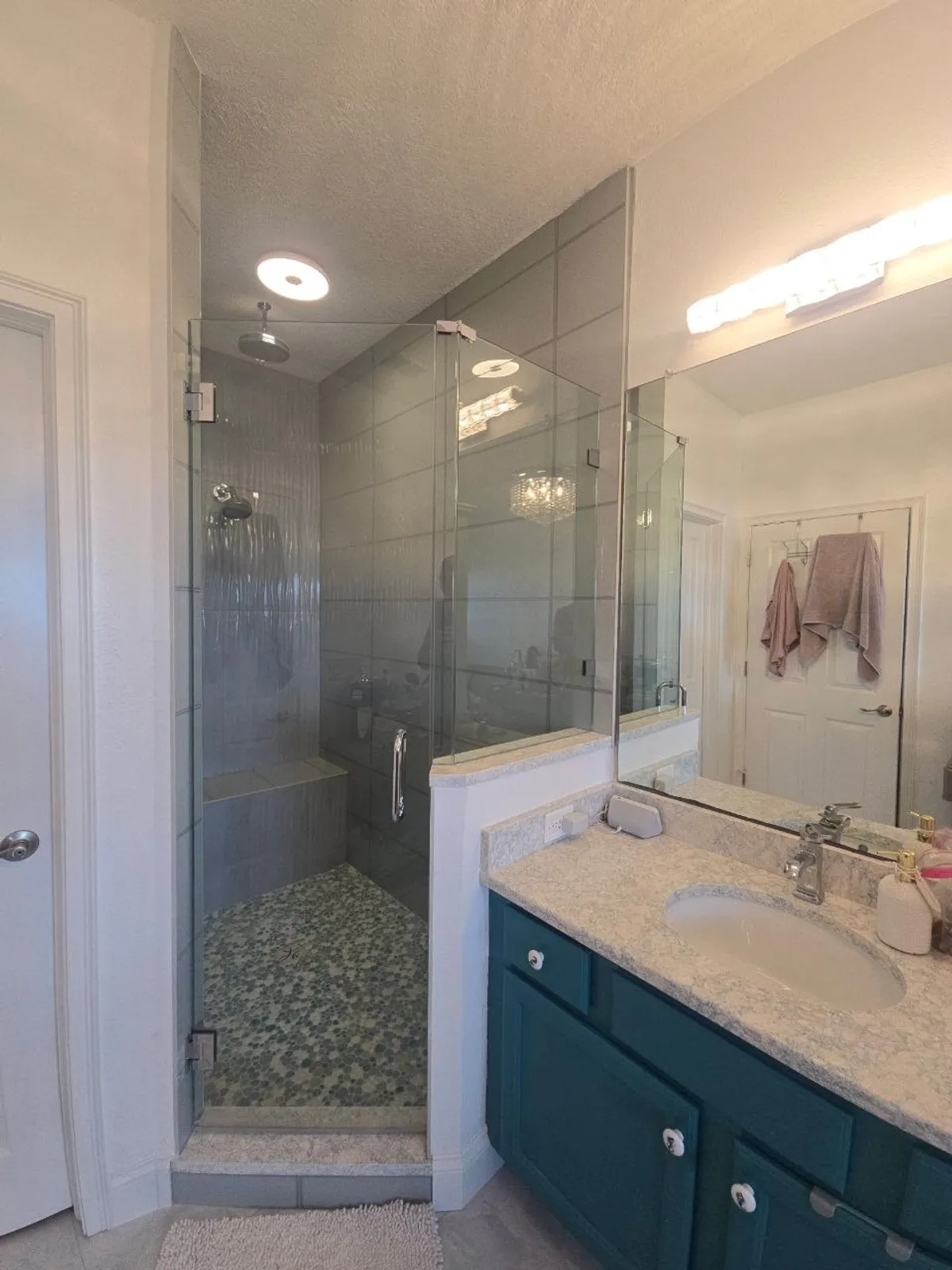 Bathroom remodel with on trend zellige tile and brushed brass fixtures